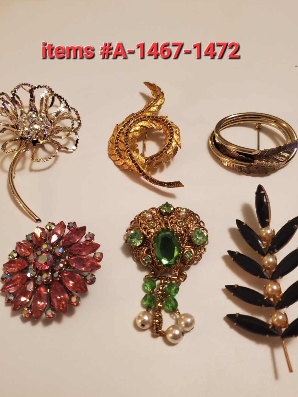 6 Brooches, items # A- 1467-1472,  wt .118 grams.